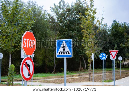traffic signs in a park for children's traffic education