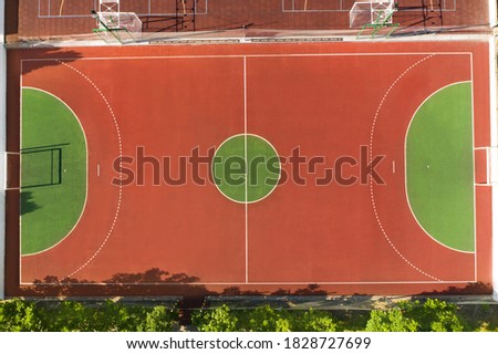 Aerial view of football pitch on sunny day