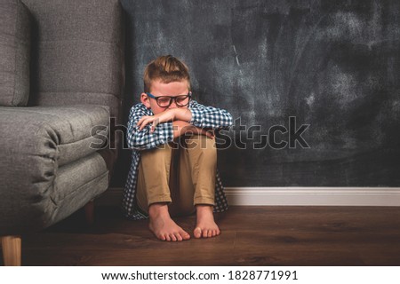 Child Abuse. Alone kid shout. School kid boy bully and sad. violenc in family form parent. Anxiety and stress. Royalty-Free Stock Photo #1828771991