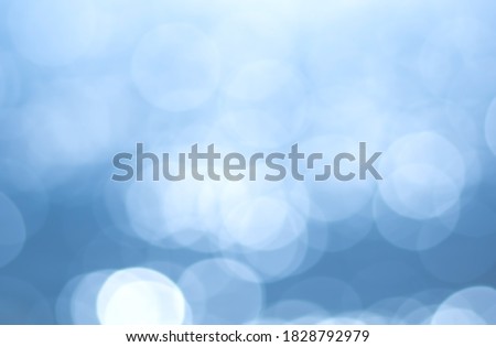 blur background abstract blue color. defocused glittering of glitter beautiful colorful soft effect pattern design for backdrop or wallpaper.

