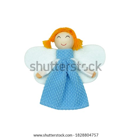  Figurine of an angel with red hair in a blue dress isolated                               