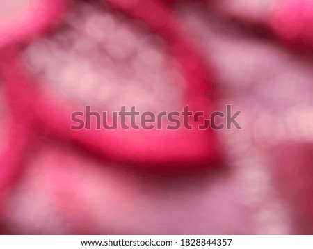 Abstract Blurred Red fabric background and texture. 