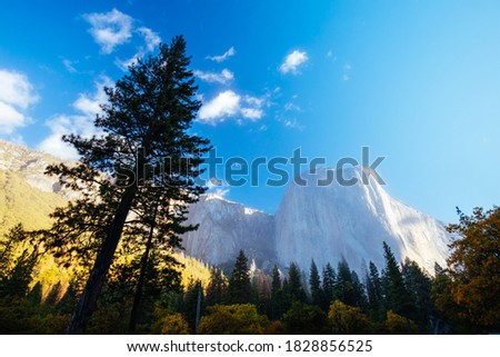 The view from within Yosemite Valley of surrounding rock faces on a stormy day in California, USA Royalty-Free Stock Photo #1828856525