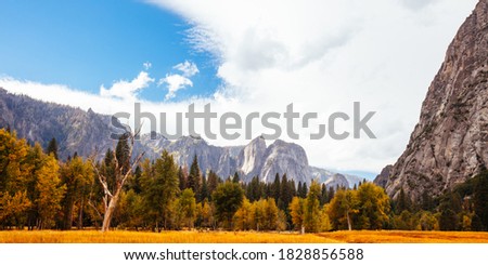 The view from within Yosemite Valley of surrounding rock faces on a stormy day in California, USA Royalty-Free Stock Photo #1828856588