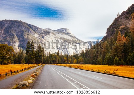 The view from within Yosemite Valley of surrounding rock faces on a stormy day in California, USA Royalty-Free Stock Photo #1828856612