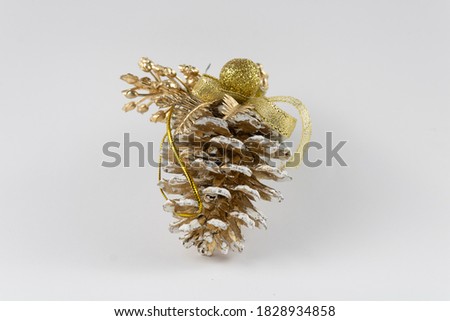 golden pineapple isolated on a white background. Christmas tree ornament