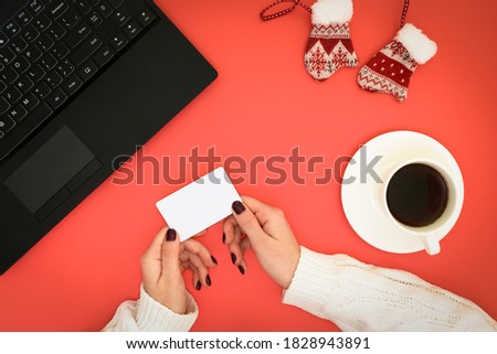 Blank business card in hand. Online business. Christmas shopping online. Concept.