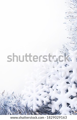 Christmas snowflakes isolated on white background. Vertical shot