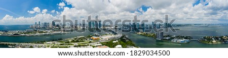 Beautiful aerial wide angle panorama Downtown Miami Biscayne Bay FL