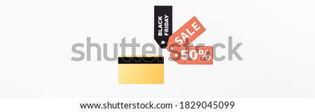 Website header of credit card and price tags with sale and black friday lettering on white background
