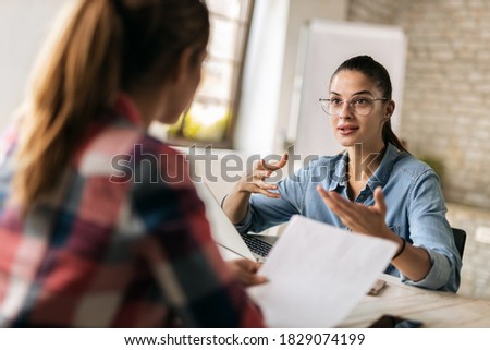 Financial advisor talking to potentional client on meeting at workplace
