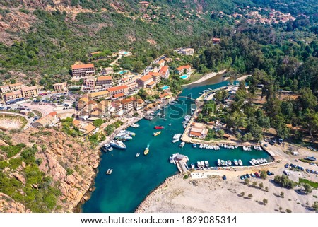 The small harbor and beach in Porto on the remote west coast of Corsica, France Royalty-Free Stock Photo #1829085314