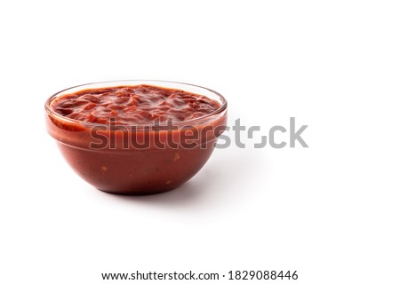 Spicy chili sauce in a bowl isolated on white background.Copy space