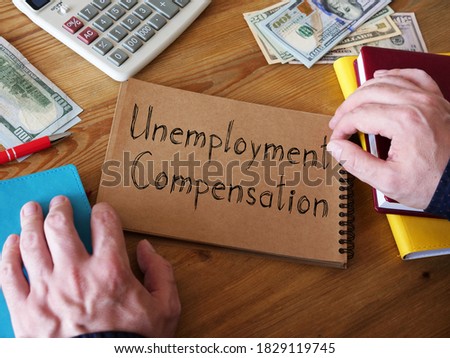 Unemployment compensation is shown on the conceptual business photo