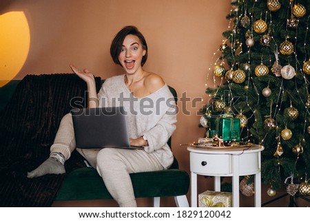 Woman shopping online on christmas sales