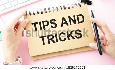 Tips and Tricks card with colorful background with defocused lights
