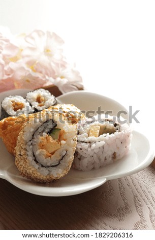 Japanese food, assorted sushi roll on white dish for casual lunch