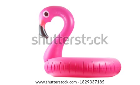 Summer fun beach. Pink pool inflatable flamingo for summer beach isolated on white background. Funny bird toy for kids.