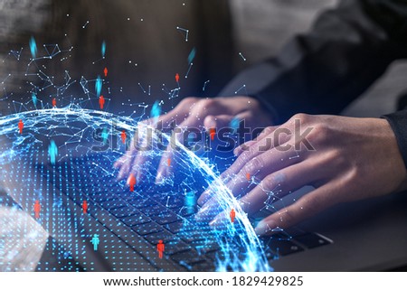Businesswoman typing on laptop in office. Social network icon hologram. People connection concept. Double exposure.