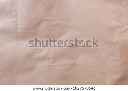 Brown crumpled paper texture, cardboard
