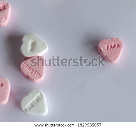Candy hearts sweet words in a pattern