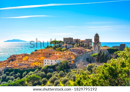 Castiglione della Pescaia, old town and sea on background. Maremma, Tuscany, Italy Europe Royalty-Free Stock Photo #1829795192