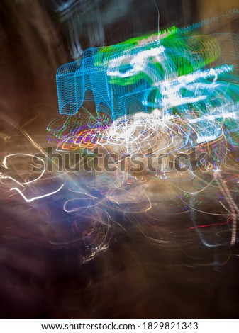 Light painting created through various light sources  residents vehicles headlight to brake light and street lamp and police light and  historical place lighting colorful vehicle  ambulance crane 