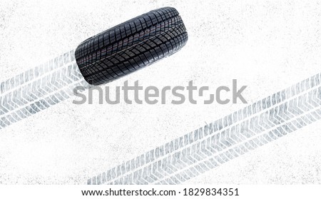 Winter Tires Tire tracks in the fresh snow Royalty-Free Stock Photo #1829834351
