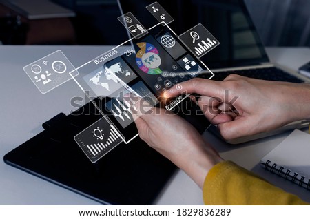 Double exposure of business hands using tablet computer and business financial stock market trading, Communication, network, technologic and market concept, Background toned image blurred.