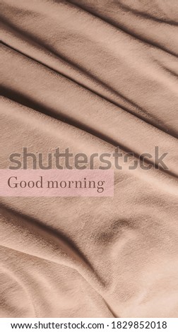 text good morning on plaid background  