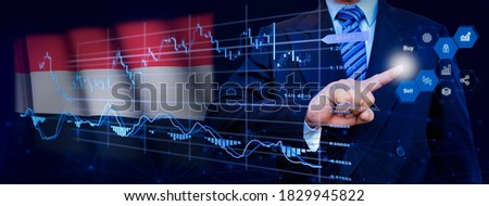Businessman touching data analytics process system with KPI financial charts, dashboard of stock and marketing on virtual interface. With Yemen flag in background.
