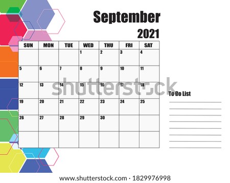 September 2021 Calendar, white background on the left, hexagons of various sizes and colors