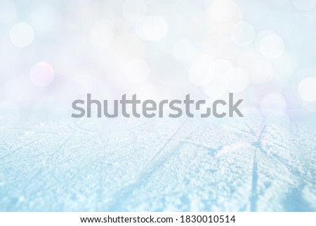 BLUE SCRATCHED ICE AND BOKEH LIGHTS, SOFT WINTER BACKDROP FOR DISPLAY OR MONTAGE PRODUCTS OR WINTER PRESENTS