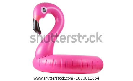Pink inflatable flamingo for summer beach isolated on white background. Pool float party. Royalty-Free Stock Photo #1830011864