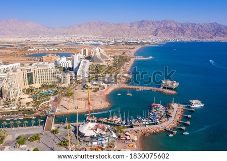 Eilat coastline, waterfront hotels and The Red Sea , Aerial view Royalty-Free Stock Photo #1830075602