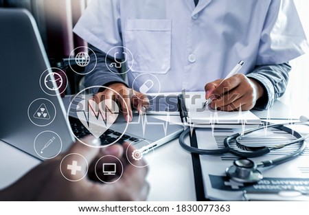 Double exposure of Doctor working with modern virtual screen interface, Healthcare And Medicine concept, Blurred background.