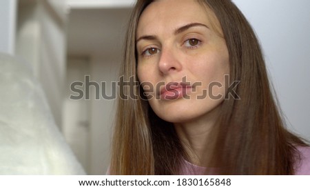 Woman in late thirties with very good skin and young look. Beautiful ageing. Skin care and ageing.