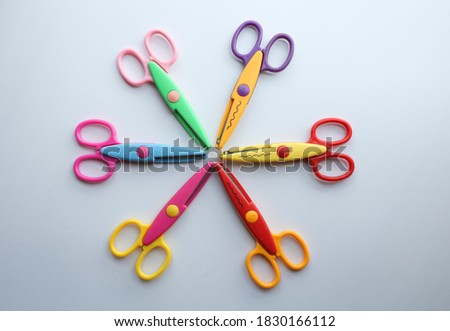 Colorful scissors isolated on a white background