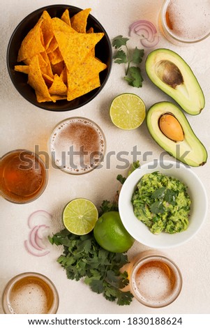 light Mexican snack or dinner Guacamole, corn chips and beer, 
