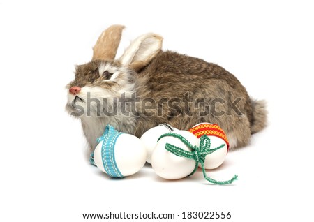 Easter holiday. Rabbit with Easter eggs.Foto.
