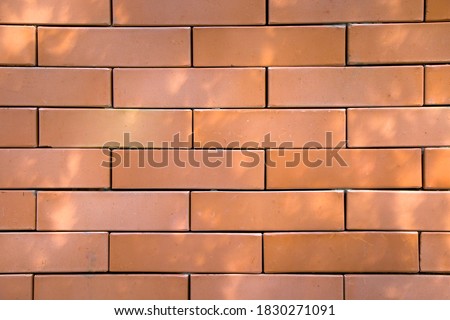 Wall background close-up, red stone wall