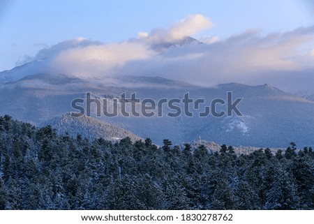 Rocky Mountain National Park and Longs Peakcovered in clouds and snow after a winter storm