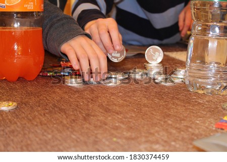 kids playing Hanukkah  game coins background