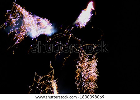 Long shot of firework in the dark