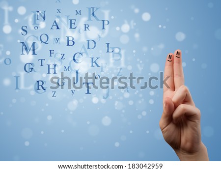 Happy cheerful smiley fingers looking at mixture of bokeh letters