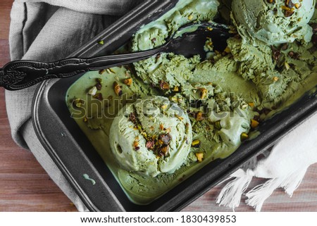 Japanese green tea matcha ice cream with pistachio flat lay. Food photography