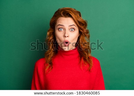 Photo of cute young lady surprised expression open mouth wear red sweater isolated green color background