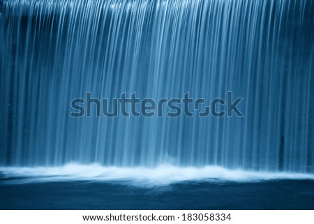waterfall in the forest in the night Royalty-Free Stock Photo #183058334