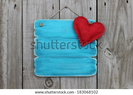 Blank antique blue sign with red heart
