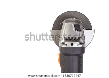 Angle grinder isolated on white background, close-up image
